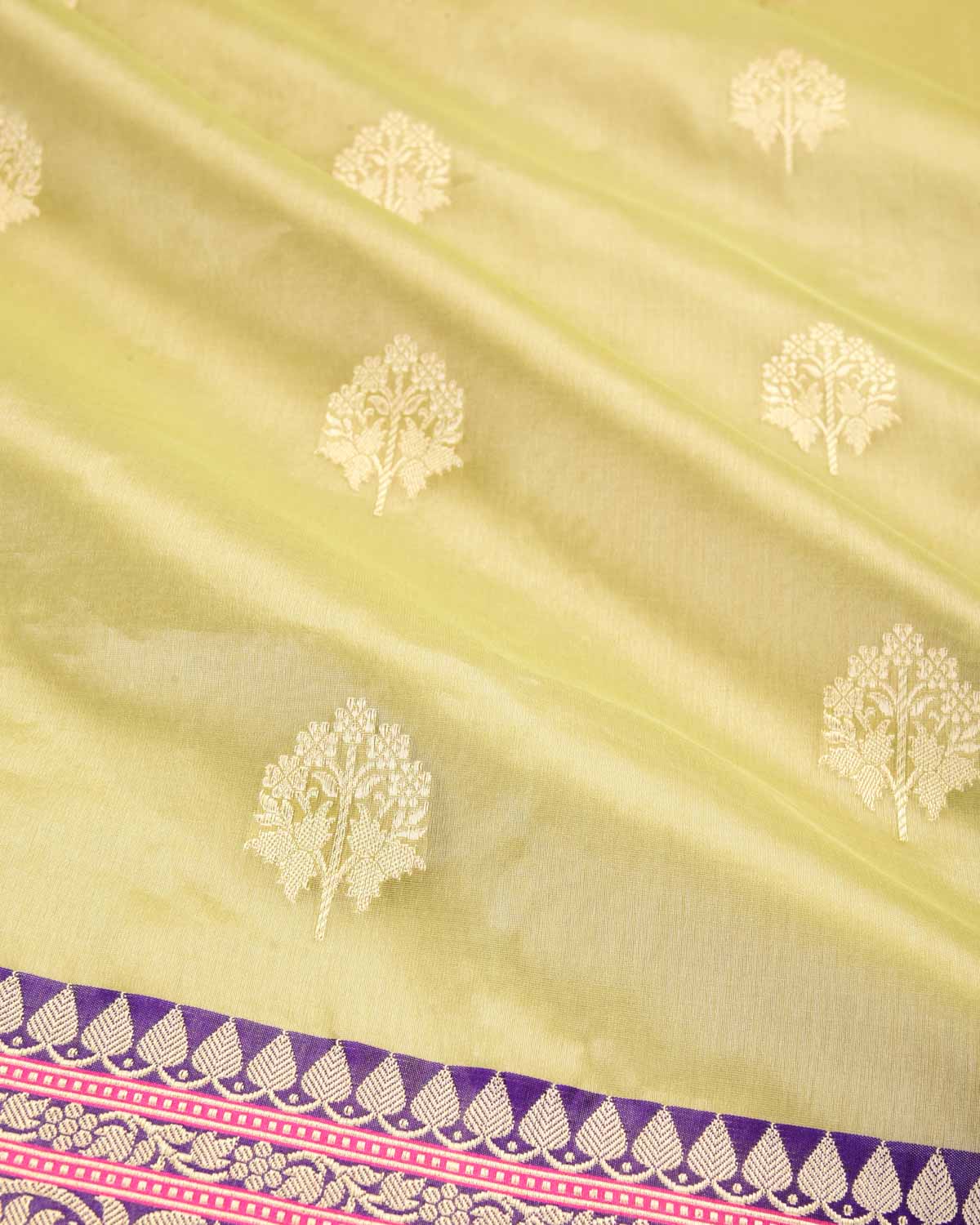 Metallic Artichoke Green Banarasi Gold Zari Buti Kadhuan Brocade Handwoven Kora Tissue Saree with Purple Silk Border Pallu-HolyWeaves