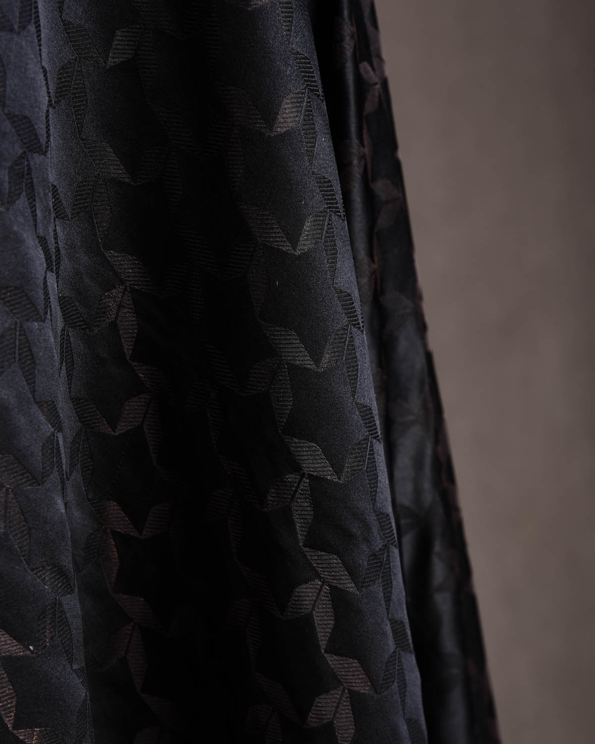 Black Kaleidoscopic Stars Satin Tanchoi Handwoven Katan Silk Banarasi Fabric-HolyWeaves